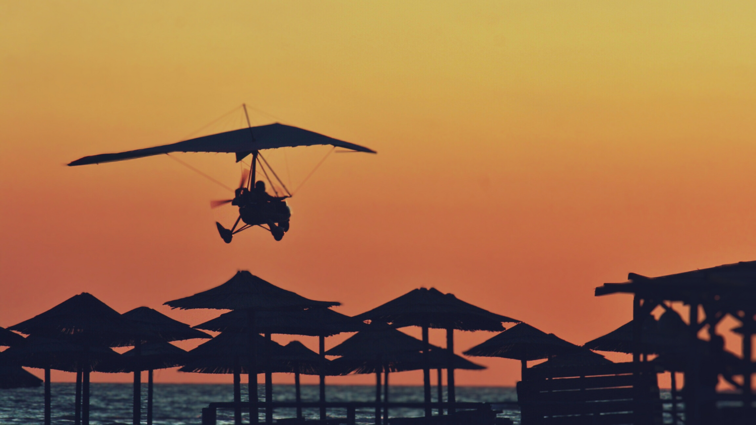 Delivery professional riding with packages, showcasing the efficiency and sustainability of electric bikes for delivery services